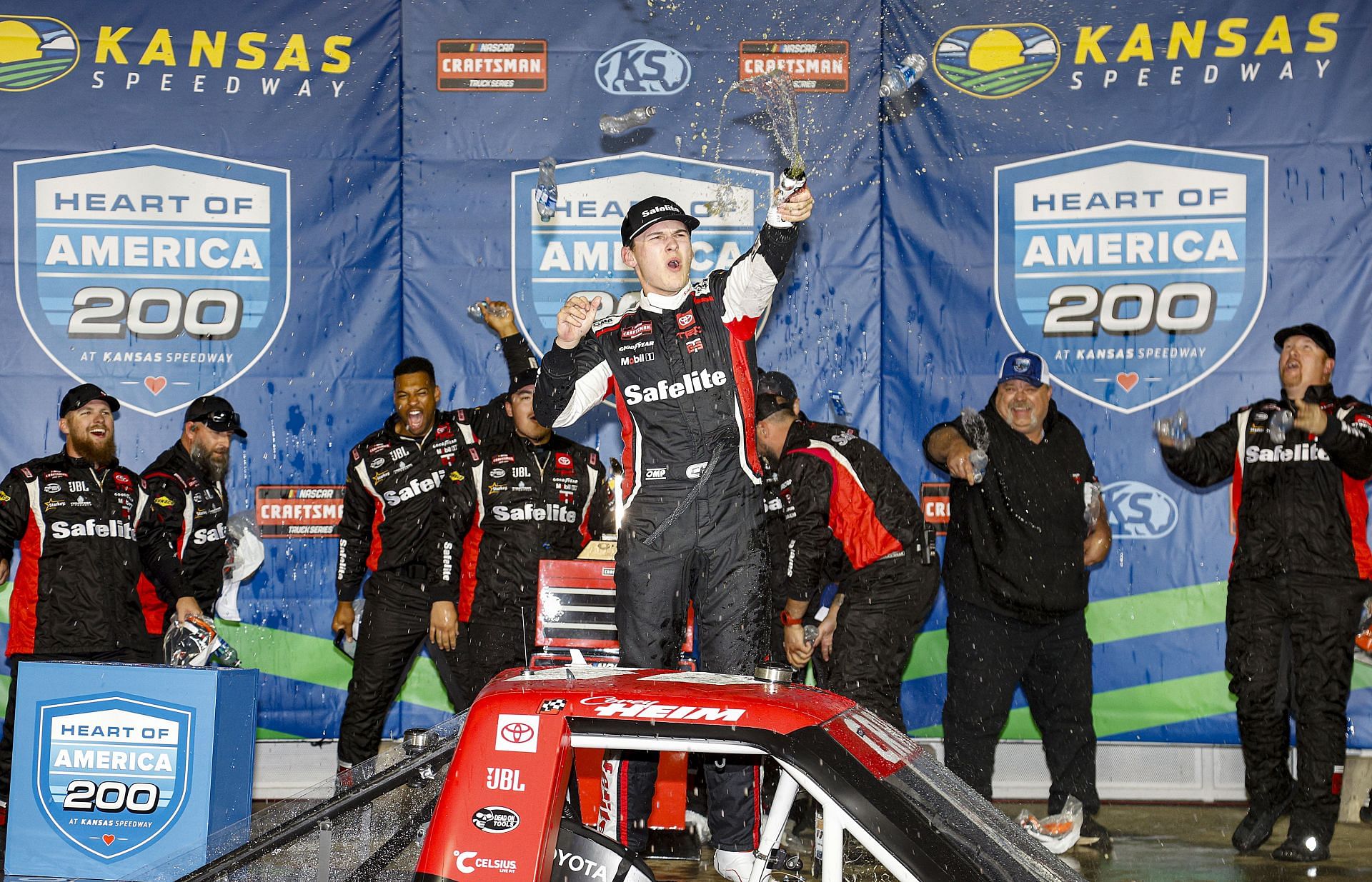 Corey Heim celebrates in victory lane at Kansas Speedway on May 04, 2024. Source: Getty